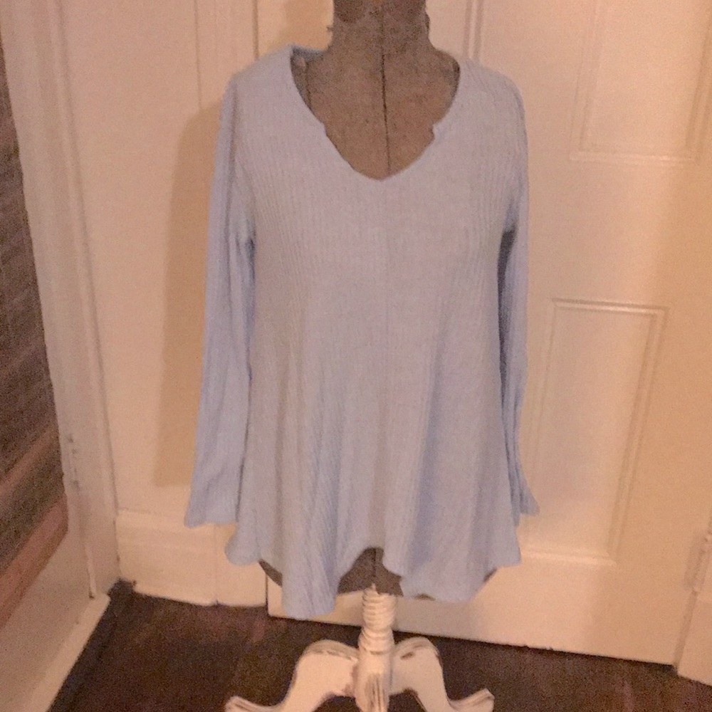 Long sleeved tunic with shark bite bottom size L